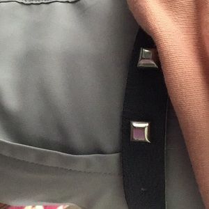 Orciani genuine leather with silver buckle.